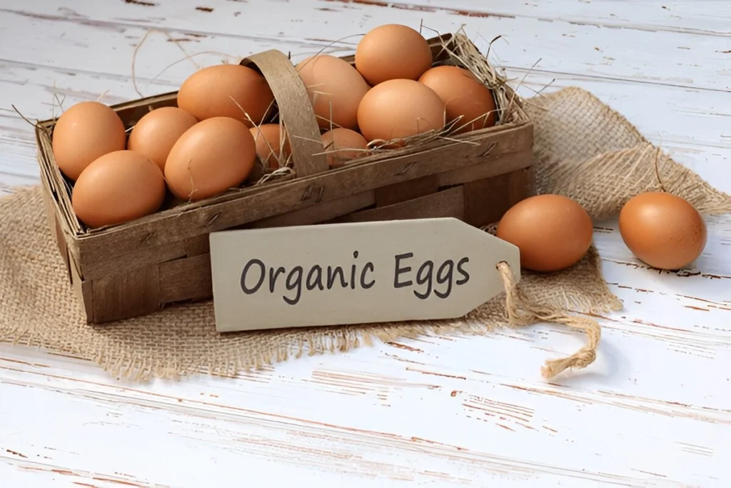 organic eggs Image showing packed in an wooden type box which has a little label - organic eggs written s